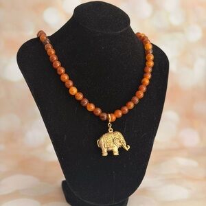 Sarah Coventry Gold Elephant Pendant Necklace with Amber Beads